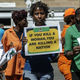 African National Congress Women League members demonstrate outside the High Court in Pretoria, South Africa, on Sept. 11, 2014, during the murder trial of double-amputee South African Olympic athlete Oscar Pistorius.
GIANLUIGI GUERCIA/Getty Images